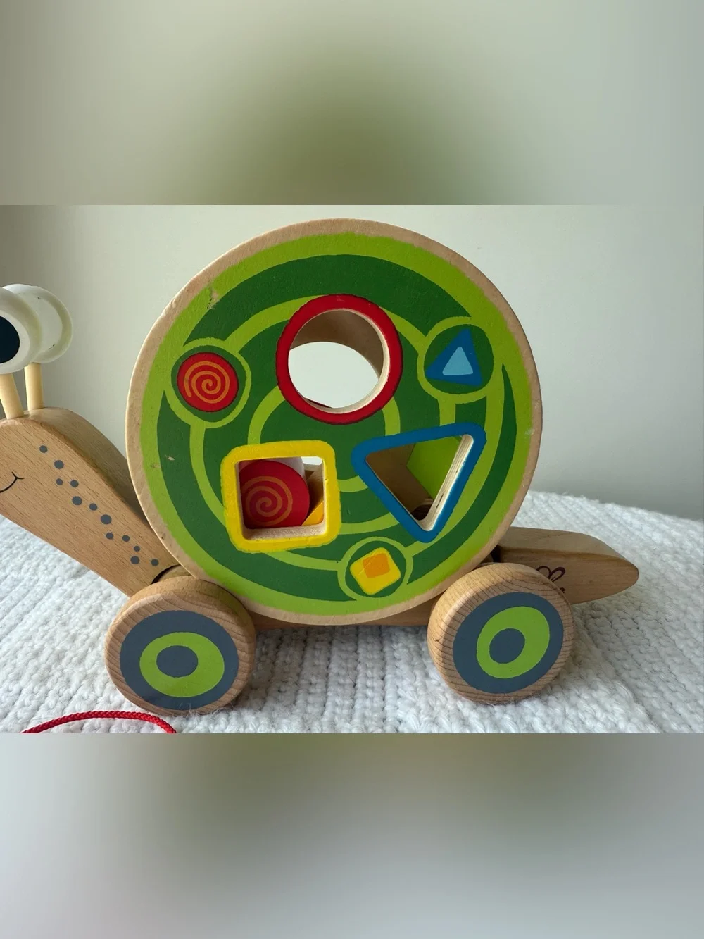 Hape Walk-A-Long Snail wooden pull toy